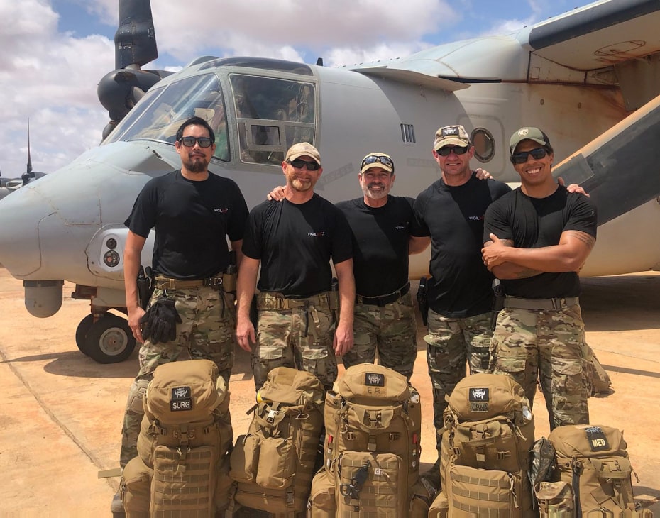 A tactical response team near aircraft